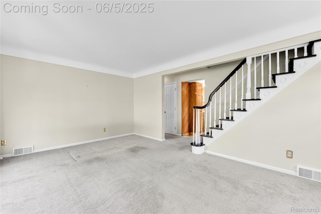 7639 Polk St, Taylor, MI 48180 - unfurnished living room with baseboards, carpet, and stairs