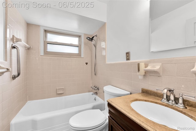7639 Polk St, Taylor, MI 48180 - bathroom featuring toilet, tub / shower combination, vanity, tile walls, and a wainscoted wall