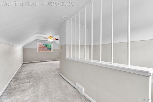 7639 Polk St, Taylor, MI 48180 - additional living space with a ceiling fan, vaulted ceiling, carpet flooring, and baseboards