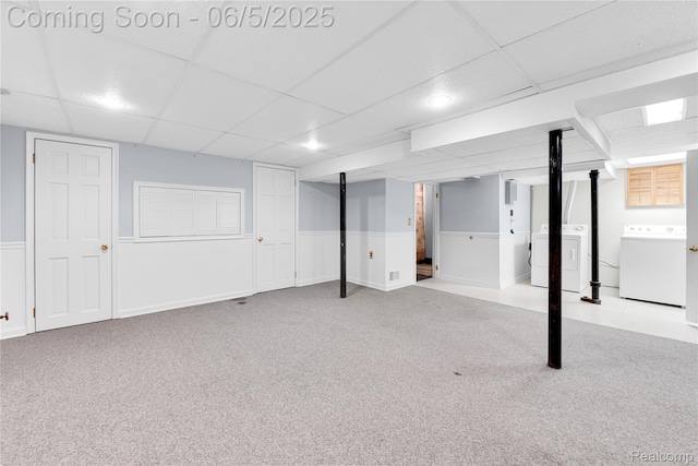 7639 Polk St, Taylor, MI 48180 - finished basement with washing machine and dryer, a paneled ceiling, carpet floors, and wainscoting