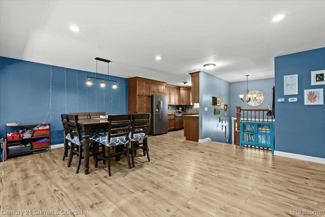 2566 Marchar Dr, Wolverine Lake, MI 48390 - dining room featuring a chandelier, light wood-style flooring, baseboards, and recessed lighting