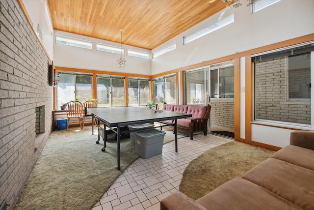2910 Elizabeth St, Wayne, MI 48184 - sunroom / solarium with wooden ceiling, a high ceiling, and brick patterned floors