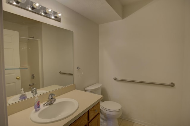 920 Oakbrook Dr, Jackson, MI 49203 - bathroom with a shower, tile patterned floors, vanity, and toilet