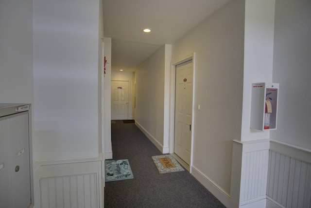 920 Oakbrook Dr, Jackson, MI 49203 - corridor with dark colored carpet and recessed lighting