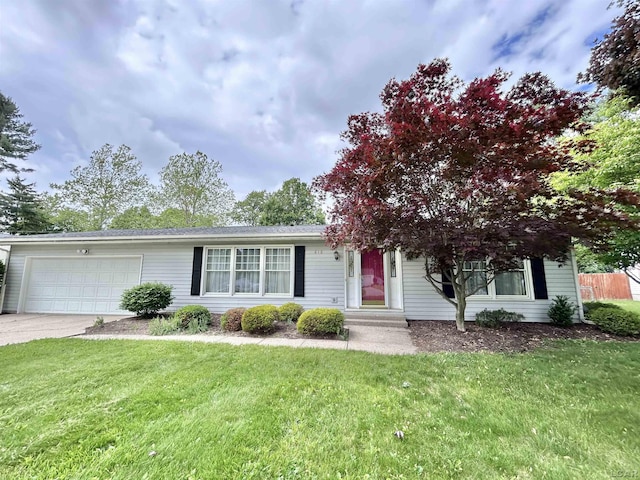 818 W Chestnut St, Morenci, MI 49256 - view of front facade with a garage, a front lawn, and driveway