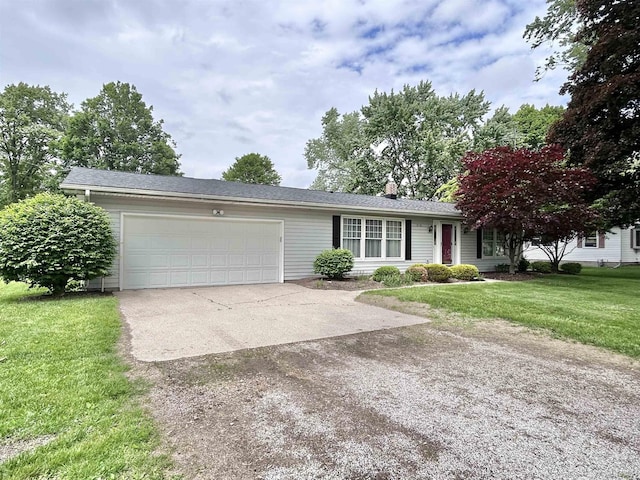 818 W Chestnut St, Morenci, MI 49256 - ranch-style home featuring concrete driveway, an attached garage, and a front lawn