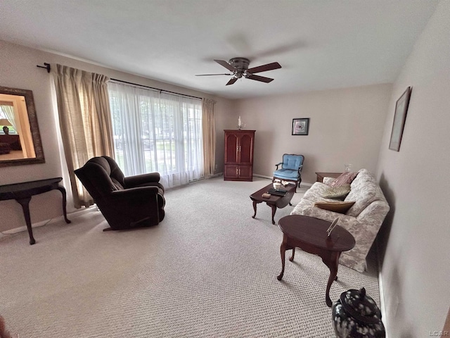 818 W Chestnut St, Morenci, MI 49256 - living room with carpet floors, ceiling fan, and baseboards