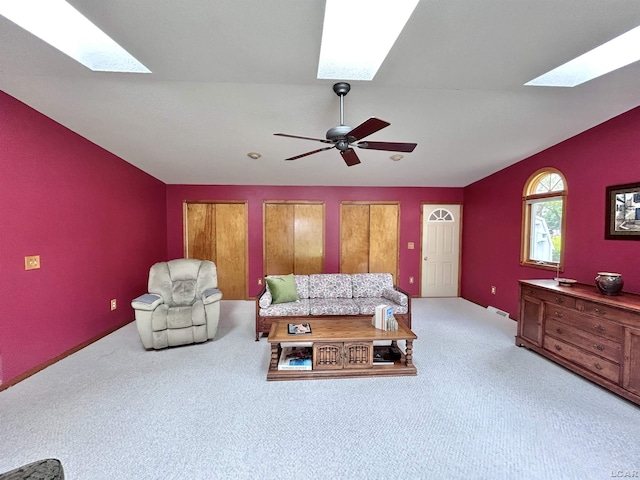 818 W Chestnut St, Morenci, MI 49256 - carpeted living room with a skylight and ceiling fan