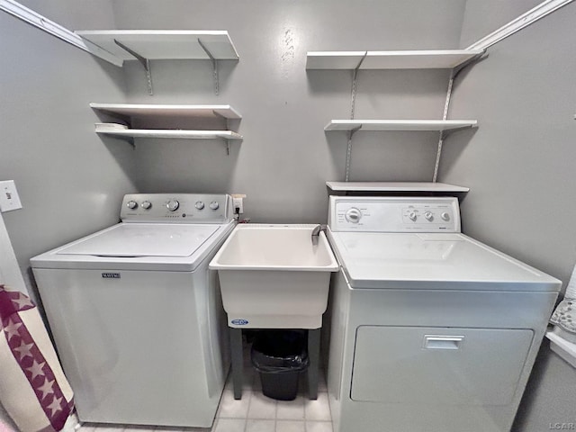 818 W Chestnut St, Morenci, MI 49256 - laundry area featuring washing machine and dryer and tile patterned flooring