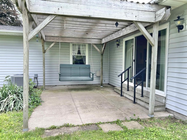 818 W Chestnut St, Morenci, MI 49256 - view of patio featuring central AC