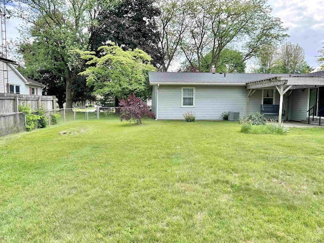 818 W Chestnut St, Morenci, MI 49256 - view of yard with central AC unit