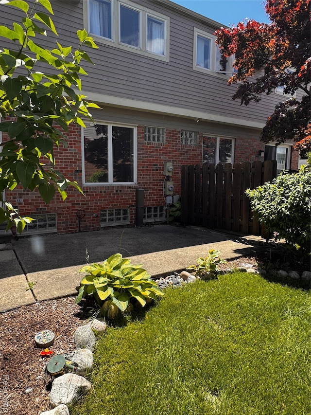 37263 Great Oaks Ct, Clinton Township, MI 48036 - rear view of house featuring a patio area and brick siding