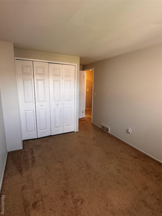 37263 Great Oaks Ct, Clinton Township, MI 48036 - unfurnished bedroom with a closet and carpet flooring