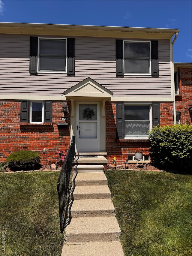37263 Great Oaks Ct, Clinton Township, MI 48036 - view of front of property with a front lawn and brick siding