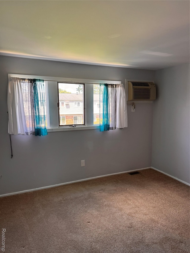 37263 Great Oaks Ct, Clinton Township, MI 48036 - carpeted empty room with a wall mounted AC and baseboards