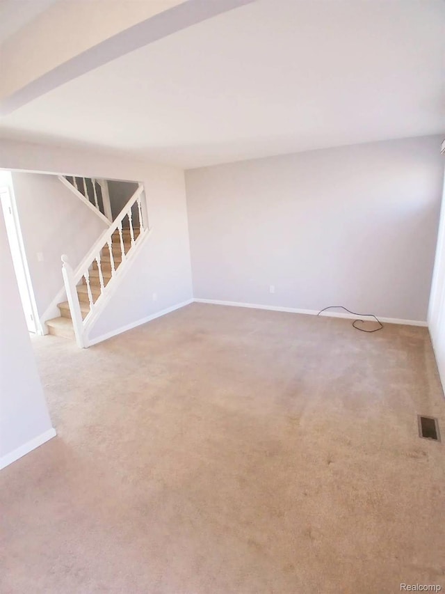 37263 Great Oaks Ct, Clinton Township, MI 48036 - carpeted empty room with stairs and baseboards