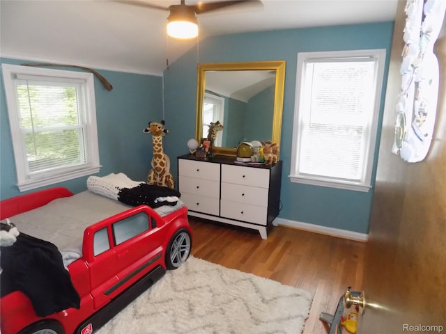 9207 Whitall Ln, Trenton, MI 48138 - bedroom featuring wood finished floors, baseboards, and ceiling fan