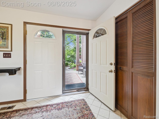 4677 Rolling Ridge Rd, West Bloomfield, MI 48323 - foyer with light tile patterned floors