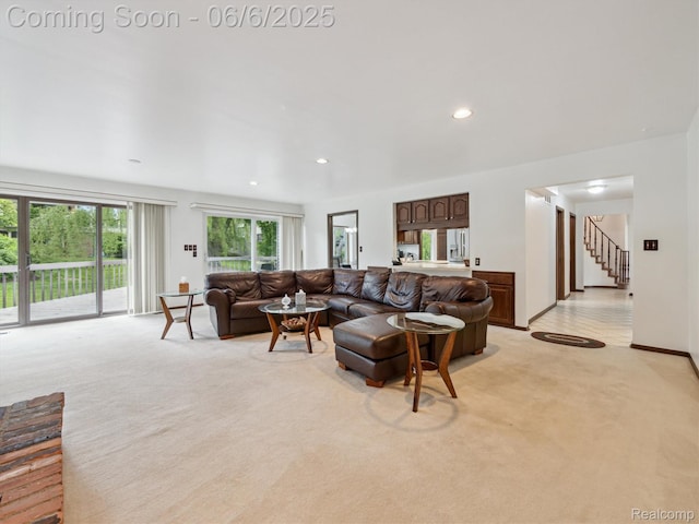 4677 Rolling Ridge Rd, West Bloomfield, MI 48323 - living room featuring light carpet, stairs, and recessed lighting