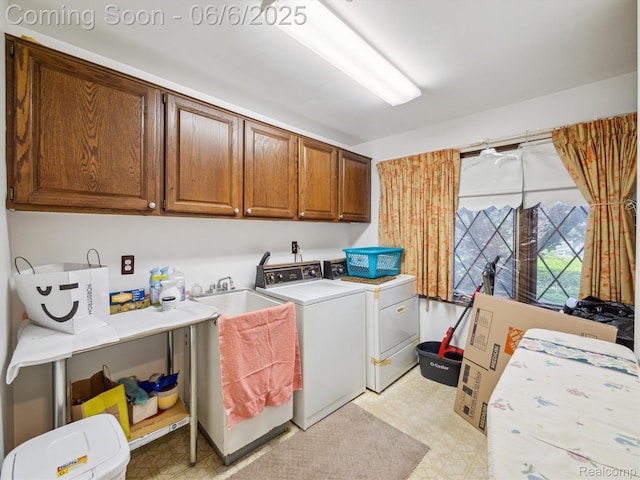 4677 Rolling Ridge Rd, West Bloomfield, MI 48323 - washroom with cabinet space, washer and dryer, and light floors