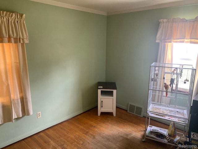 17439 Brody Ave, Allen Park, MI 48101 - unfurnished room featuring wood finished floors, baseboards, and ornamental molding