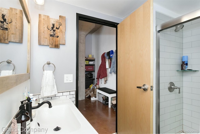 55 W Canfield Unit 210, Detroit, MI 48201 - full bathroom featuring a shower stall and a sink