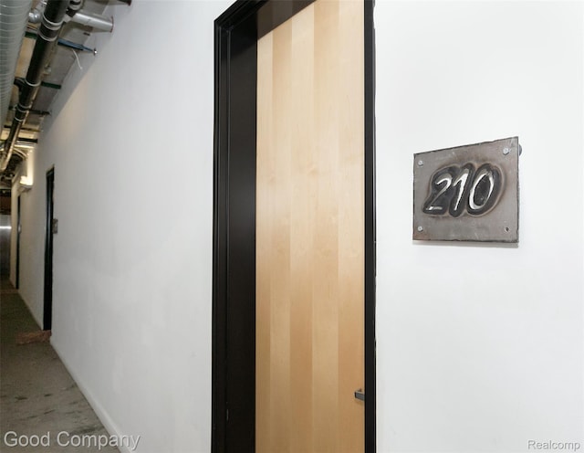 55 W Canfield Unit 210, Detroit, MI 48201 - hall featuring carpet floors