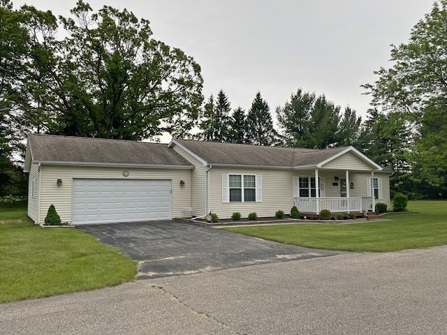 10439 Castaway Ct, Canadian Lakes, MI 49346 - single story home featuring a porch, an attached garage, driveway, and a front yard