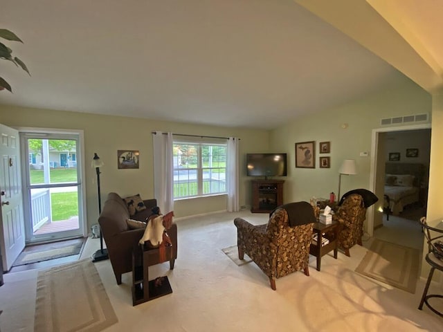 10439 Castaway Ct, Canadian Lakes, MI 49346 - carpeted living room with healthy amount of natural light