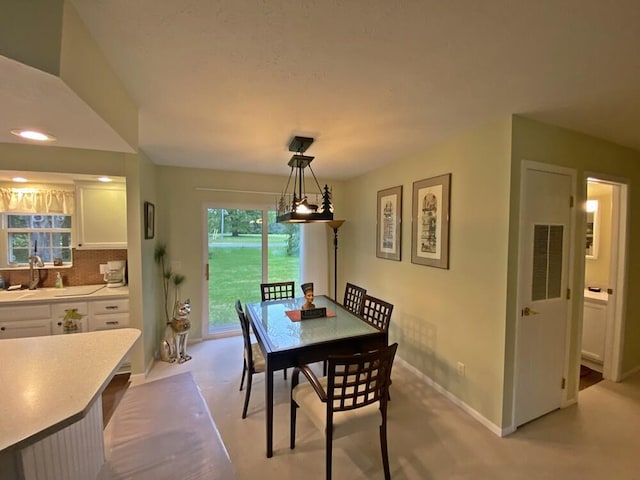 10439 Castaway Ct, Canadian Lakes, MI 49346 - dining room with baseboards