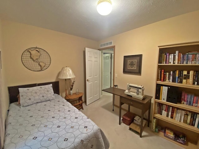 10439 Castaway Ct, Canadian Lakes, MI 49346 - carpeted bedroom with a textured ceiling