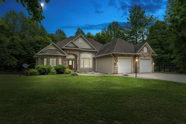 11082 Hoffman Rd, Marcellus, MI 49067 - view of front facade featuring stone siding, a garage, and concrete driveway
