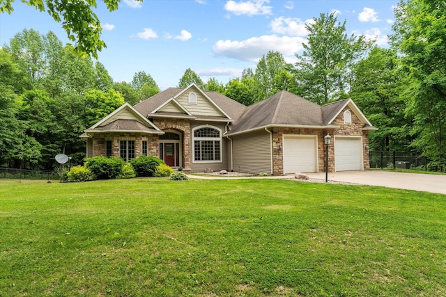 11082 Hoffman Rd, Marcellus, MI 49067 - view of front facade featuring stone siding, a garage, concrete driveway, and roof with shingles