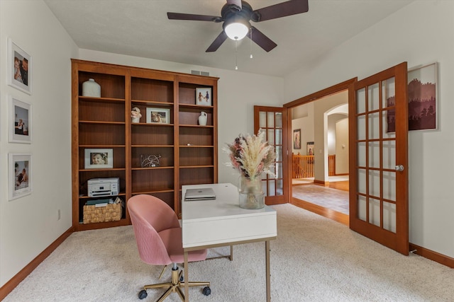 11082 Hoffman Rd, Marcellus, MI 49067 - carpeted home office with arched walkways, baseboards, a ceiling fan, and french doors