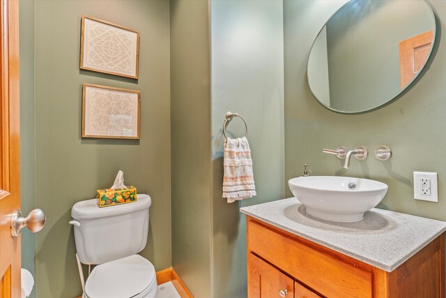11082 Hoffman Rd, Marcellus, MI 49067 - bathroom with toilet and vanity
