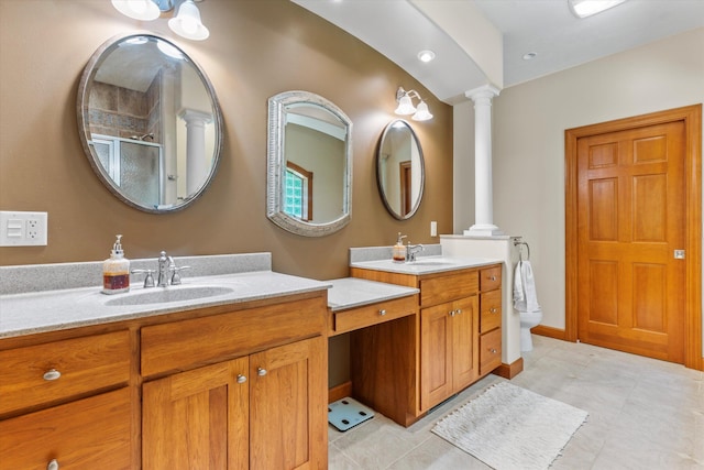 11082 Hoffman Rd, Marcellus, MI 49067 - full bath with ornate columns, vanity, a shower with door, and toilet