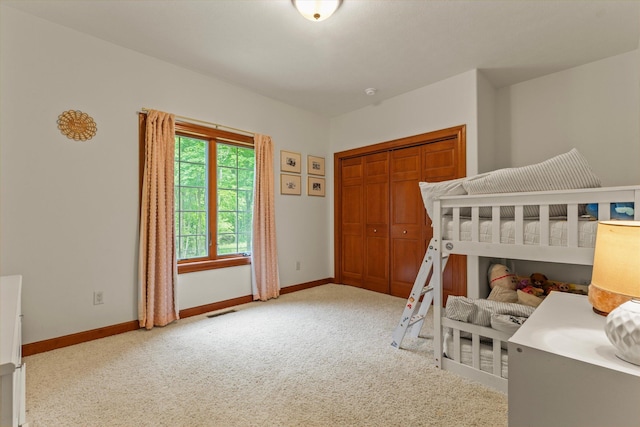 11082 Hoffman Rd, Marcellus, MI 49067 - carpeted bedroom with baseboards and a closet