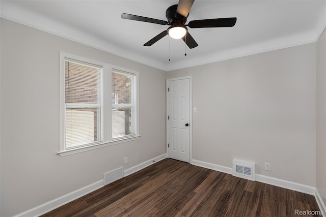 7505 E Robinwood St, Detroit, MI 48234 - unfurnished room with dark wood-style flooring, baseboards, ceiling fan, and ornamental molding