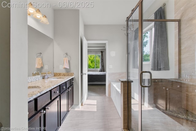 21109 Oak Ridge Dr, Clinton Township, MI 48036 - full bathroom with double vanity, ensuite bath, a bath, a shower with door, and tile patterned flooring