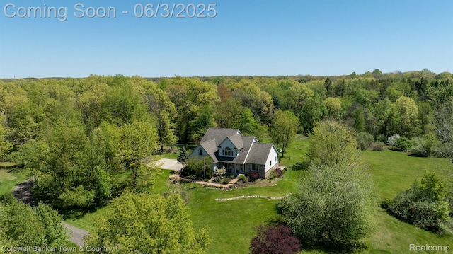 1355 Maxfield Rd, Brighton, MI 48114 - view from above of property featuring a heavily wooded area