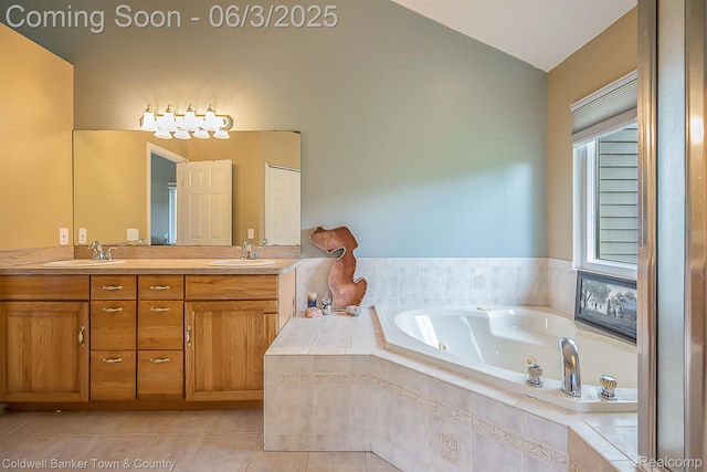 1355 Maxfield Rd, Brighton, MI 48114 - bathroom with vaulted ceiling, double vanity, a jetted tub, and tile patterned flooring