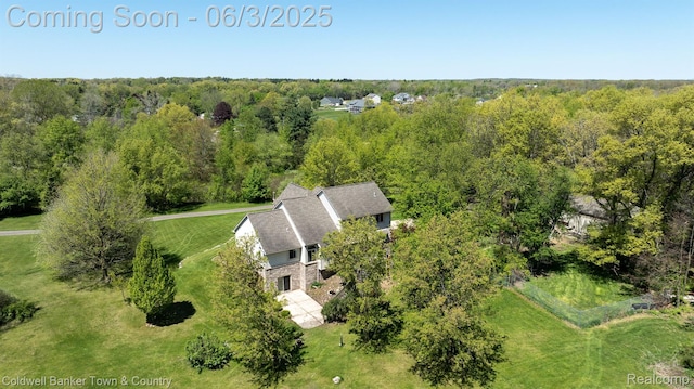 1355 Maxfield Rd, Brighton, MI 48114 - view from above of property with a heavily wooded area