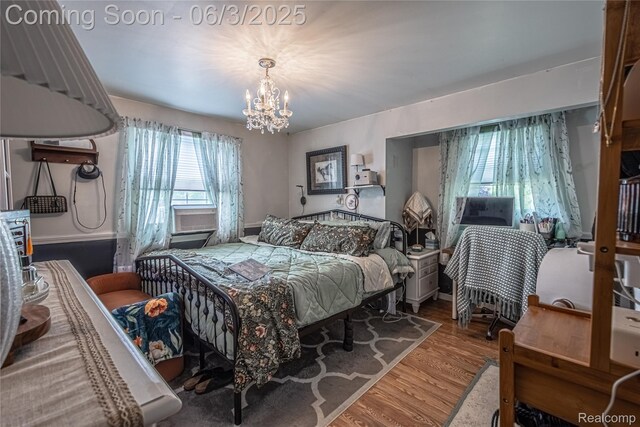 527 Montana St, Marysville, MI 48040 - bedroom featuring a chandelier and wood finished floors