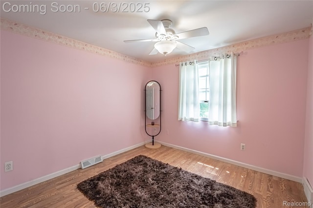 527 Montana St, Marysville, MI 48040 - unfurnished room with a ceiling fan, wood finished floors, and baseboards