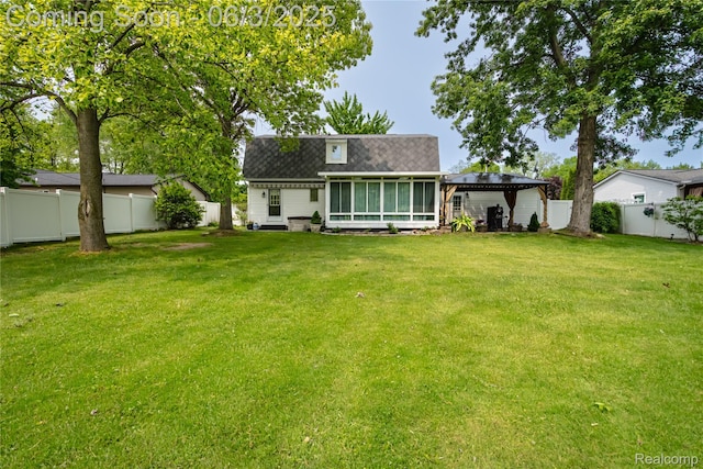 527 Montana St, Marysville, MI 48040 - back of property with a gazebo and a sunroom