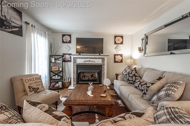 527 Montana St, Marysville, MI 48040 - living area featuring a fireplace and wood finished floors