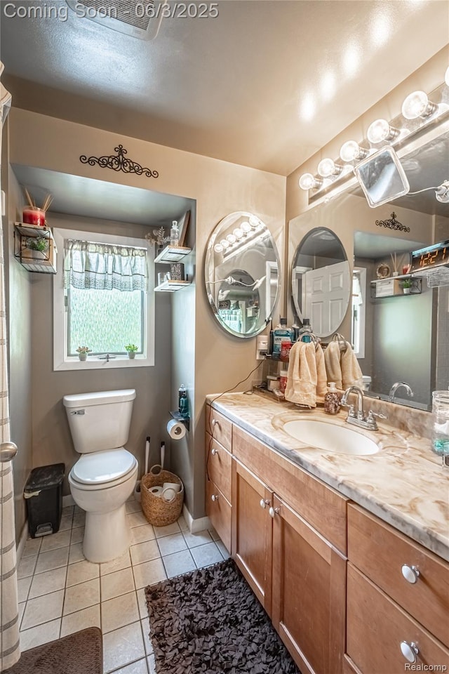 527 Montana St, Marysville, MI 48040 - bathroom featuring vanity, tile patterned flooring, and toilet