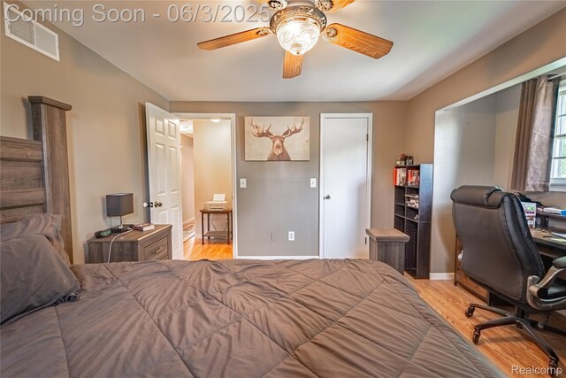 527 Montana St, Marysville, MI 48040 - bedroom featuring wood finished floors, an office area, baseboards, and a ceiling fan