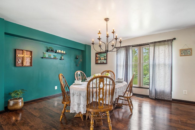 2278 W Wagner Rd, Buchanan, MI 49107 - dining space featuring a chandelier, hardwood / wood-style flooring, and baseboards