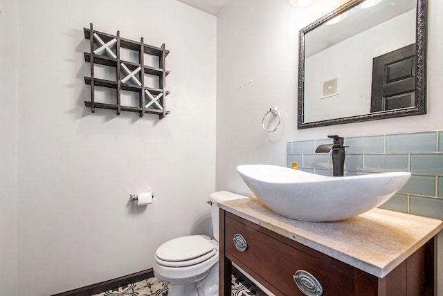 2278 W Wagner Rd, Buchanan, MI 49107 - half bathroom with toilet, vanity, and baseboards
